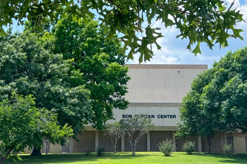 Front Bob Duncan Center showing luscious green trees 